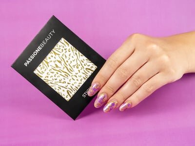 unghie leopardate rosa e oro